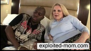 Hardcore Blowjob between a Mature Blonde and a Black guy